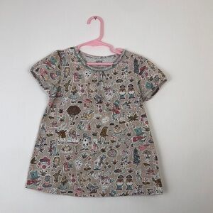 Liberty of London shortsleeve tee Alice in Wonderland printed theme on tan (7-8)